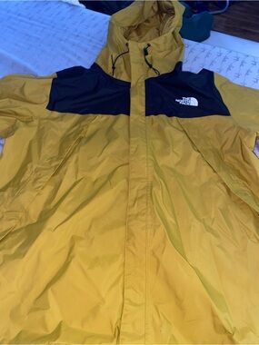 The North Face Men’s Yellow Raincoat with Black Shoulder Panels